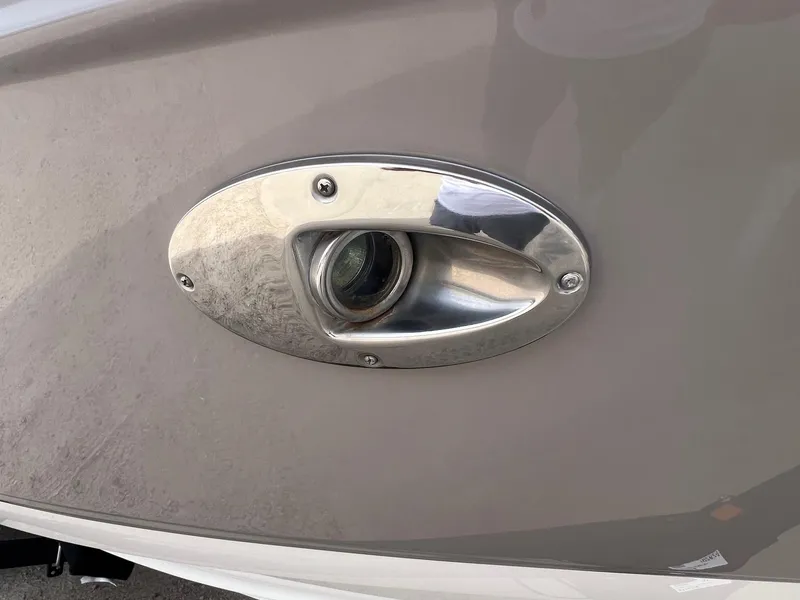 Slide: The Image of Close-up of a 2008 Chaparral 220 SSi boat's chrome exhaust outlet. - 6