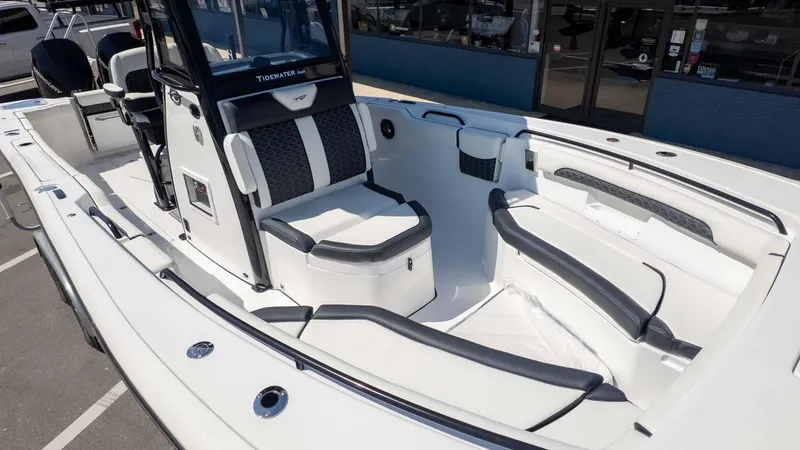 Slide: The Image of 2025 Tidewater 272cc boat interior with sleek seating and modern design. - 12