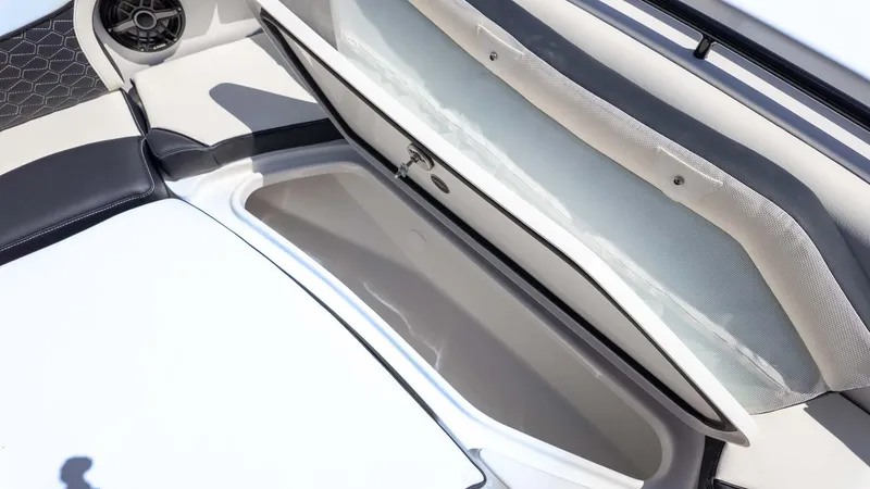 Slide: The Image of 2025 Tidewater 272cc boat interior storage compartment with sleek design and modern features. - 22