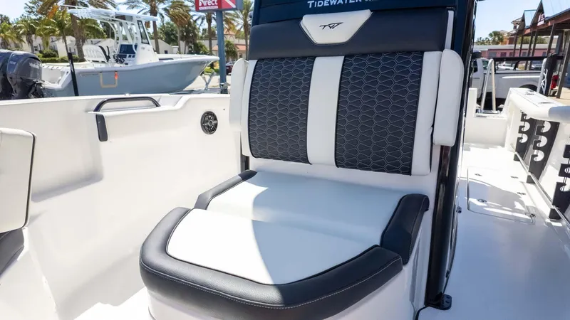 Slide: The Image of 2025 Tidewater 272cc boat interior with stylish seating and modern design. - 25