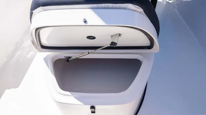 Slide: The Image of Open storage compartment on 2025 Tidewater 272cc boat. - 26