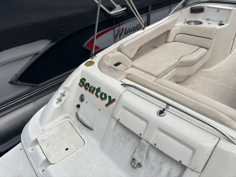 Slide: The Image of Monterey 220 Explorer boat, 2000 model, with seating area and "Seatoy" name visible. - 6