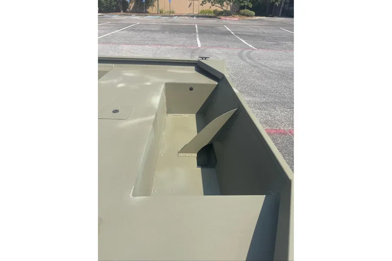 Slide: The Image of 2025 Tracker Grizzly 1860 Utility boat interior, showcasing durable construction and spacious design. - 5