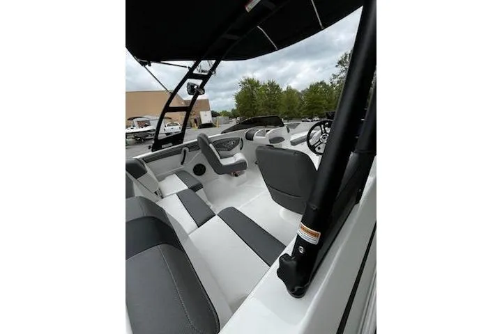 Slide: The Image of 2025 Tahoe T21 boat interior with sleek seating and modern design. - 5