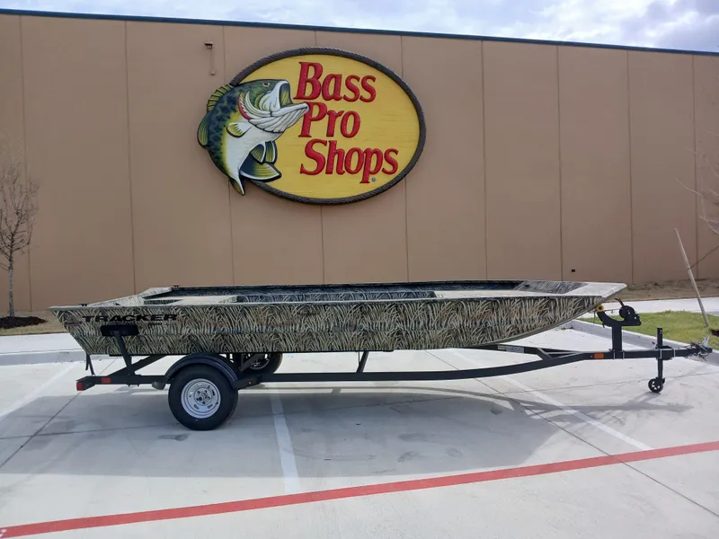 The Image of 2025 Tracker GRIZZLY 1860 Utility boat at Bass Pro Shops parking lot. - 0