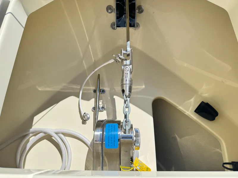 Slide: The Image of Anchor system of 2025 Chris-Craft Calypso 28 boat, featuring stainless steel components. - 32