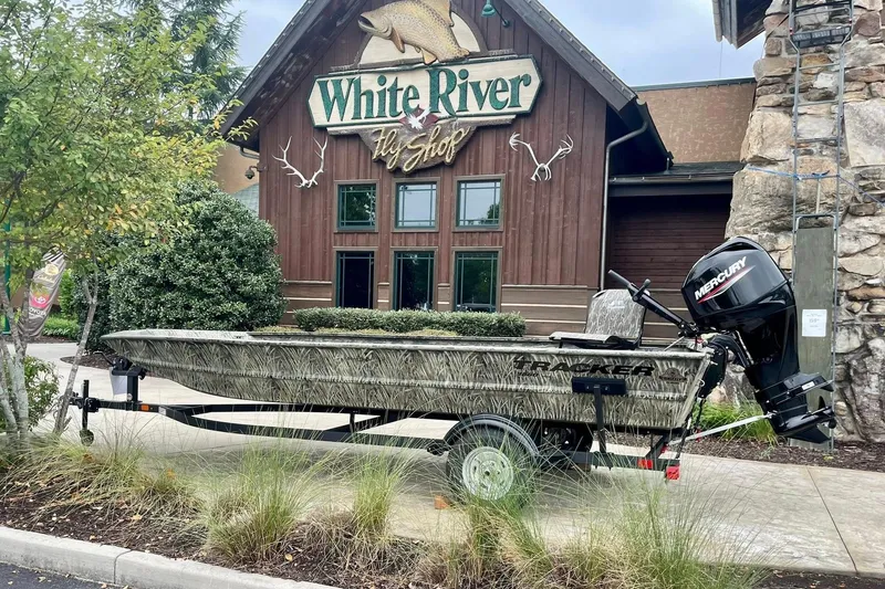 The Image of 2025 Tracker Grizzly 1860 Utility boat outside White River Fly Shop. - 0