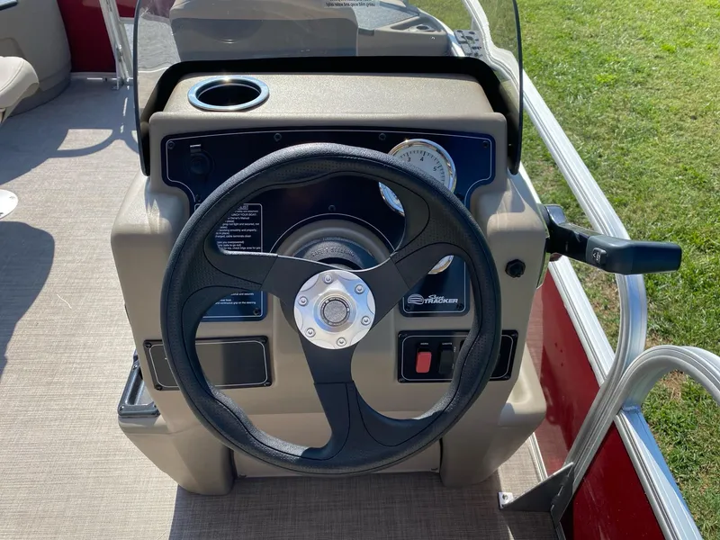 Slide: The Image of Steering console of 2025 Sun Tracker Bass Buggy 18 DLX pontoon boat. - 4