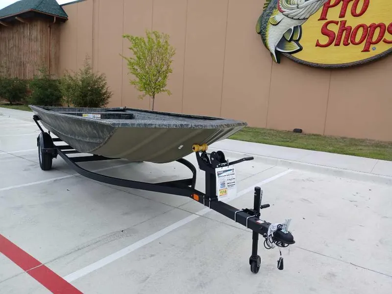 Slide: The Image of 2025 Tracker GRIZZLY 1860 Utility boat on trailer outside Pro Shop. - 3