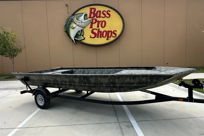 The Image of 2025 Tracker Grizzly 1860 Utility boat on trailer at Bass Pro Shops. - 6