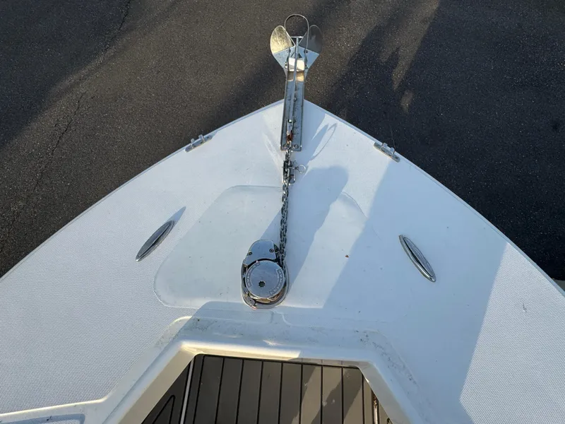 Slide: The Image of Bow of 2015 Ocean Runner 2900 boat with anchor and chain mechanism. - 14