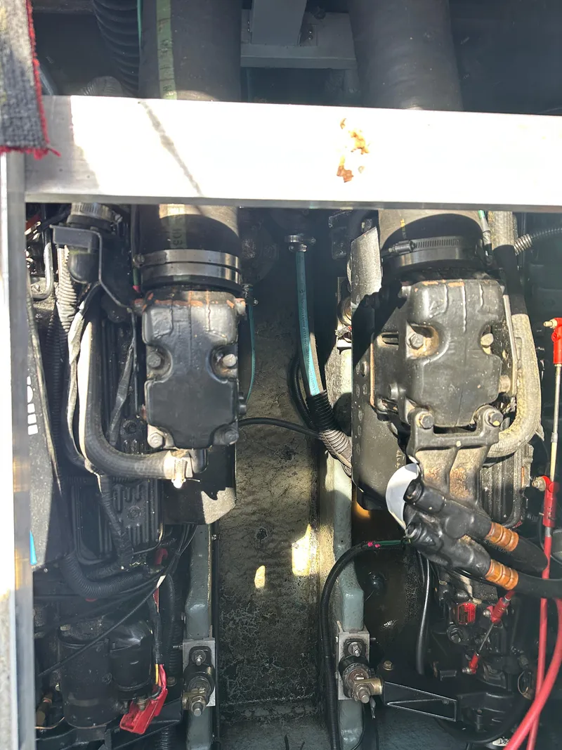 Slide: The Image of Engine compartment of a 1990 Sea Ray 310 Sundancer boat. - 27