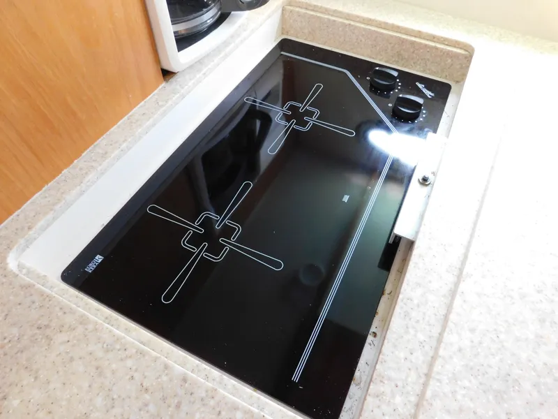 Slide: The Image of Ceramic cooktop in 2001 Tiara Yachts 3800 Open galley kitchen. - 38