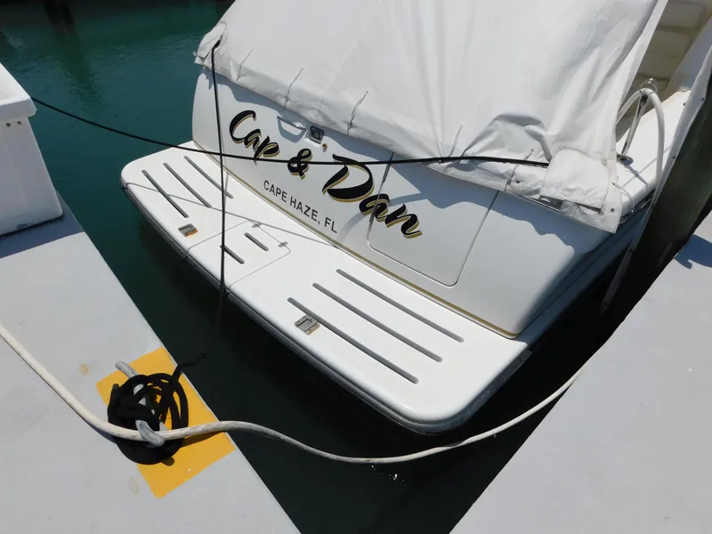 Slide: The Image of 2001 Tiara Yachts 3800 Open docked, rear view with cover, Cape Haze, FL. - 4