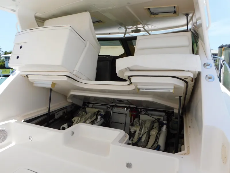 Slide: The Image of 2001 Tiara Yachts 3800 Open engine compartment with open hatch, showcasing dual engines. - 49