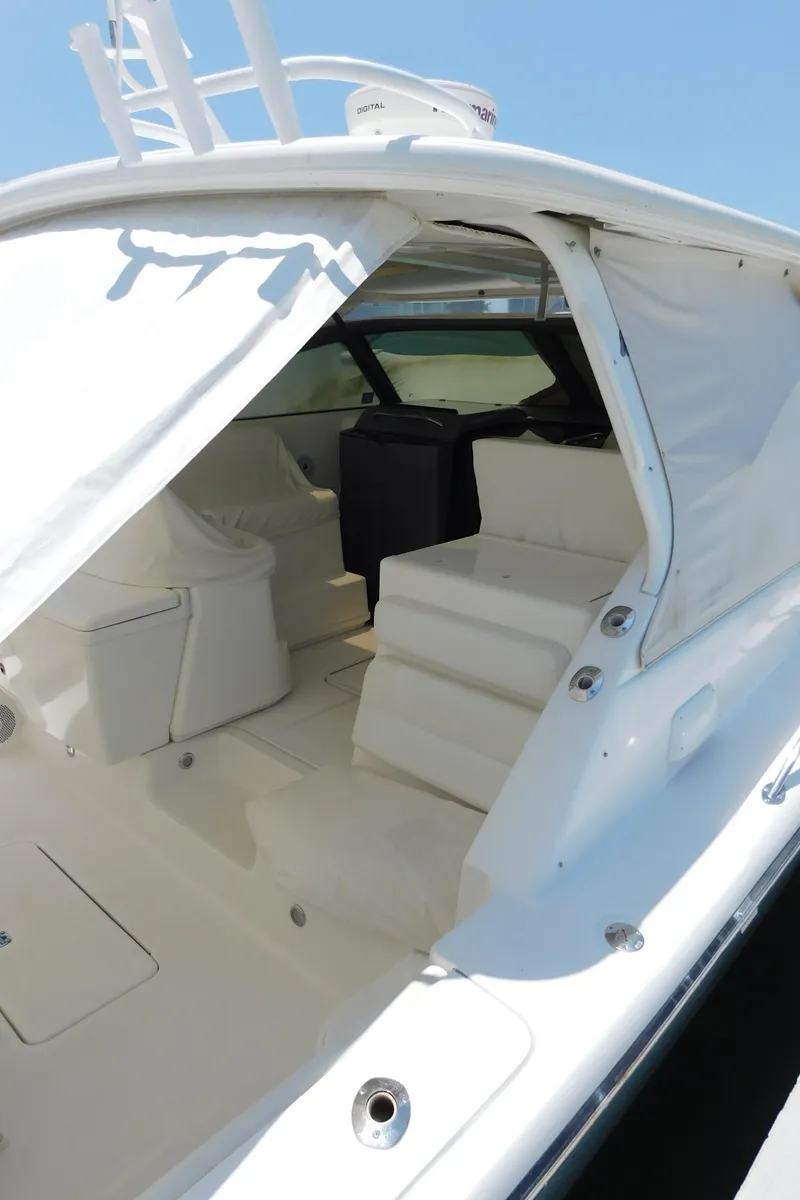Slide: The Image of 2001 Tiara Yachts 3800 Open, white exterior, open cockpit view, sunny day. - 6
