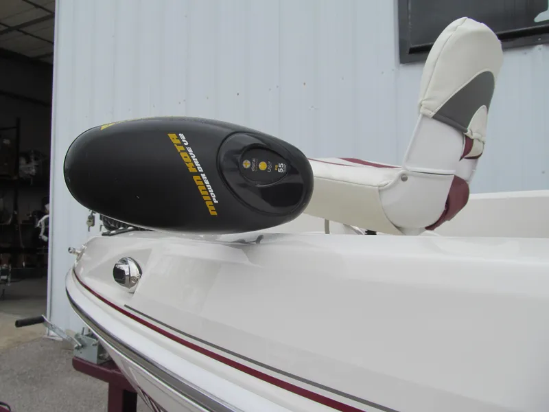 Slide: The Image of 2016 Tahoe 550 TF boat with trolling motor and cushioned seat. - 14