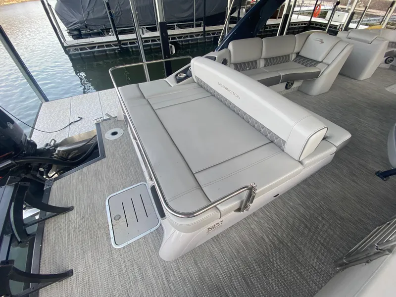 Slide: The Image of 2020 Bennington 30 QSBAX2 boat interior with luxurious seating and modern design. - 19