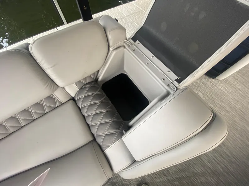 Slide: The Image of 2020 Bennington 30 QSBAX2 boat seat with open storage compartment. - 35