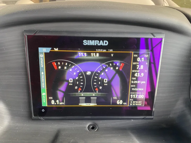 Slide: The Image of Simrad display on 2020 Bennington 30 QSBAX2 showing speed, depth, and fuel data. - 41