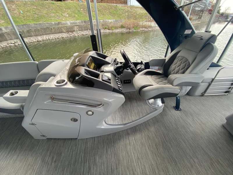 Slide: The Image of 2020 Bennington 30 QSBAX2 boat interior with modern helm and comfortable seating. - 44