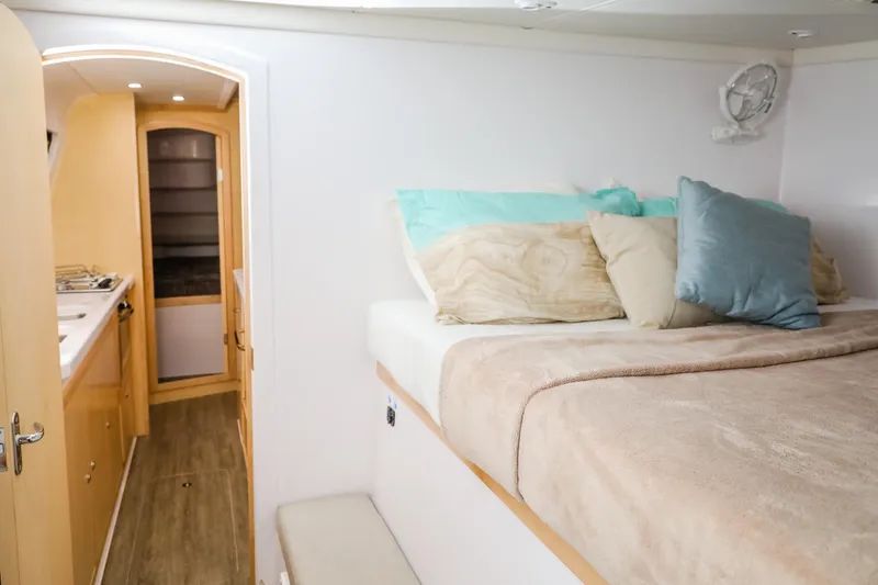 Slide: The Image of 2025 Seawind 1260 yacht interior with cozy bedroom and modern design. - 28