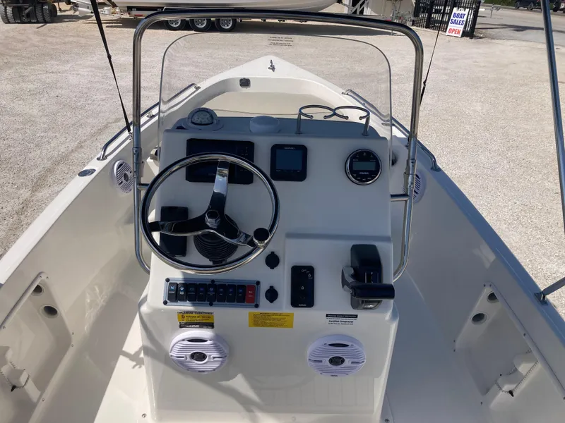 Slide: The Image of 2025 Key West 1720CC boat console with steering wheel and controls. - 7