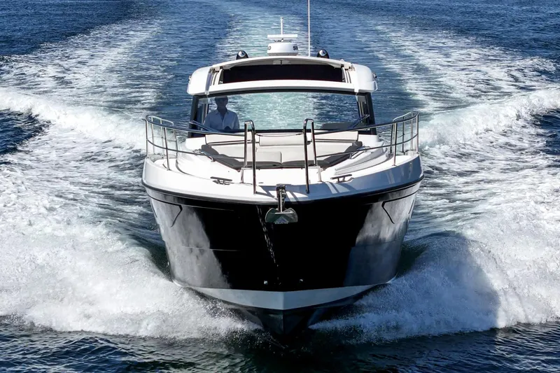 Slide: The Image of 2023 Bavaria SR36 yacht cruising on open water, front view. - 16