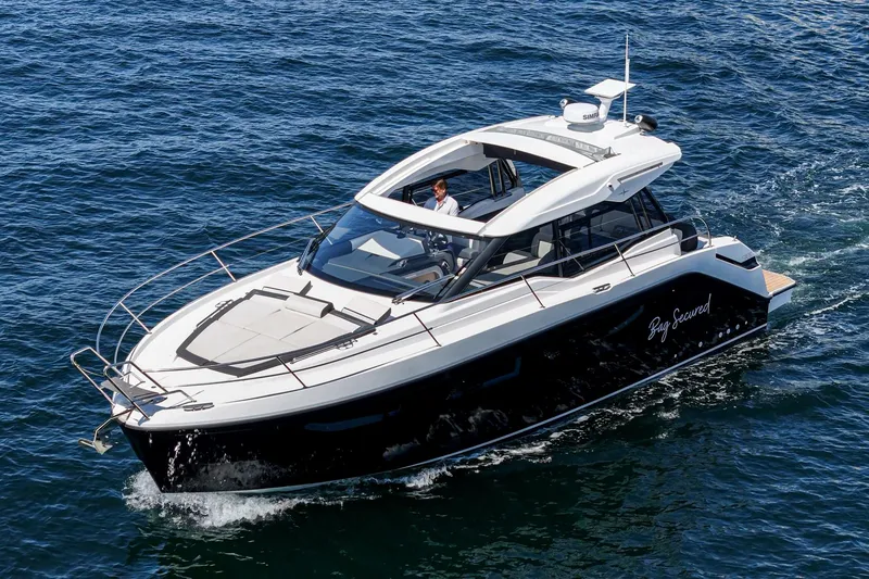 Slide: The Image of 2023 Bavaria SR36 yacht cruising on open water, showcasing sleek design and luxury features. - 20
