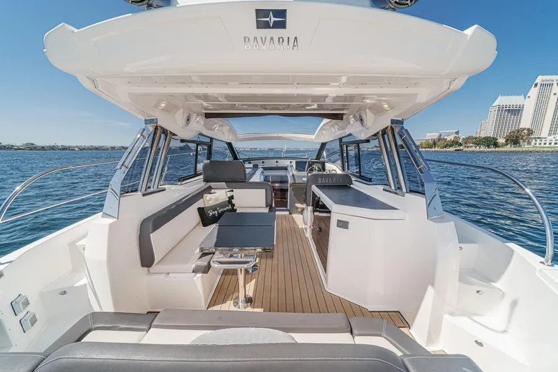 Slide: The Image of 2023 Bavaria SR36 yacht interior with sleek design and waterfront view. - 25