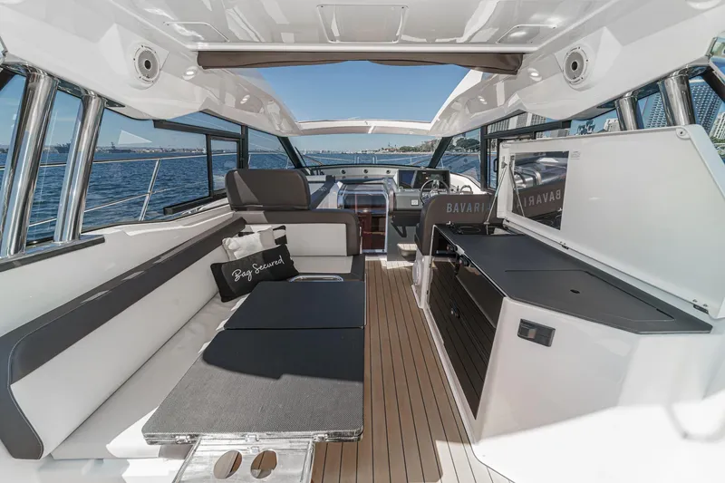 Slide: The Image of Luxurious 2023 Bavaria SR36 yacht interior with sleek seating and modern design. - 27