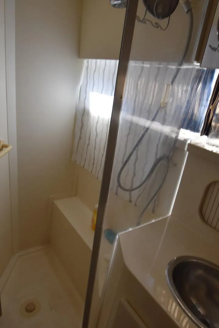 Slide: The Image of Bathroom interior of 1997 Carver 405 Aft Cabin Motoryacht with shower and sink. - 35