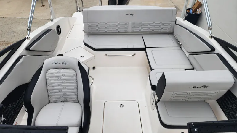 Slide: The Image of 2024 Sea Ray SPX 210 OB boat interior with stylish seating and modern design. - 14
