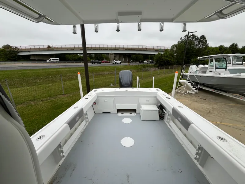 Slide: The Image of 2025 Steiger Craft 255 Miami boat deck with spacious seating and storage. - 5