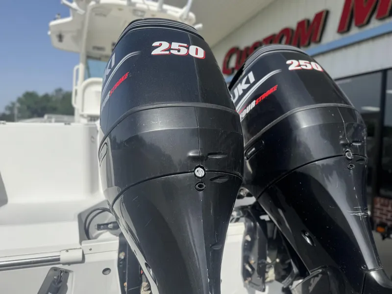 Slide: The Image of Twin Suzuki 250 outboard motors on a 2007 Everglades 260CC boat. - 6
