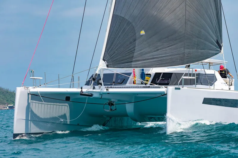 The Image of 2025 Seawind 1600 Passagemaker catamaran sailing on blue ocean waters. - 0