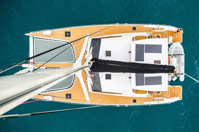 Slide: The Image of Aerial view of 2025 Seawind 1600 Passagemaker catamaran with solar panels on deck. - 21