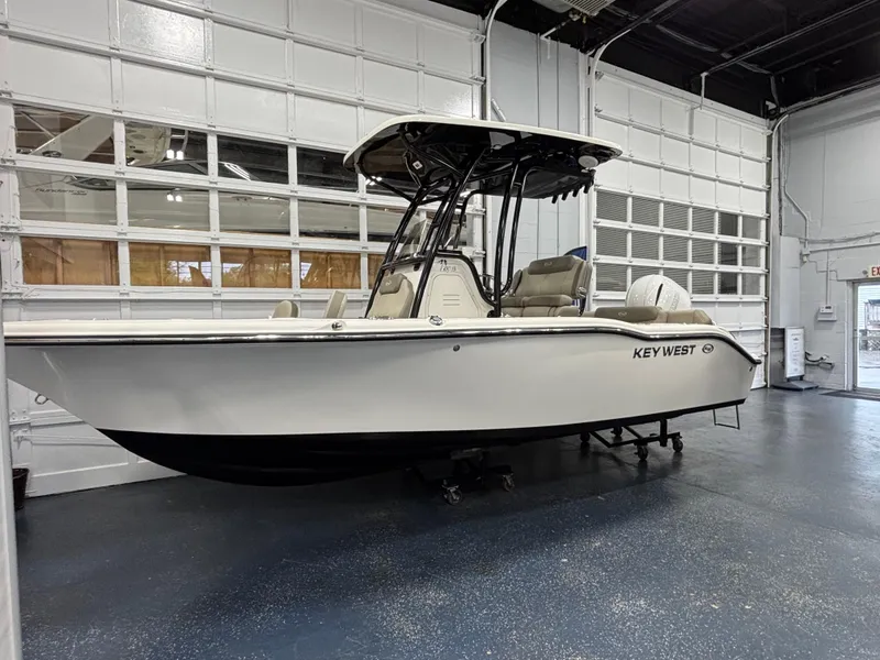 Slide: The Image of 2023 Key West 219 FS boat in showroom, side view. - 20