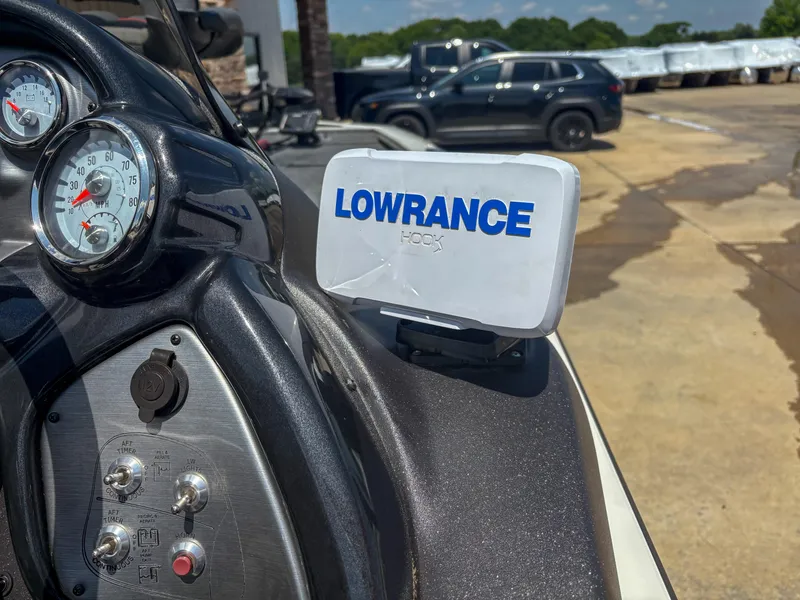 Slide: The Image of 2023 Tracker Pro Team 195 TXW boat dashboard with Lowrance fish finder. - 4