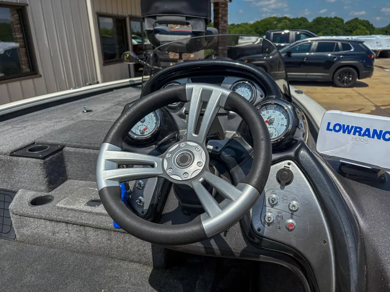 Slide: The Image of Steering wheel of 2023 Tracker Pro Team 195 TXW Tournament Edition boat. - 5