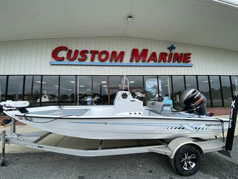 The Image of 2021 Xpress H190B boat on trailer at Custom Marine dealership. - 0