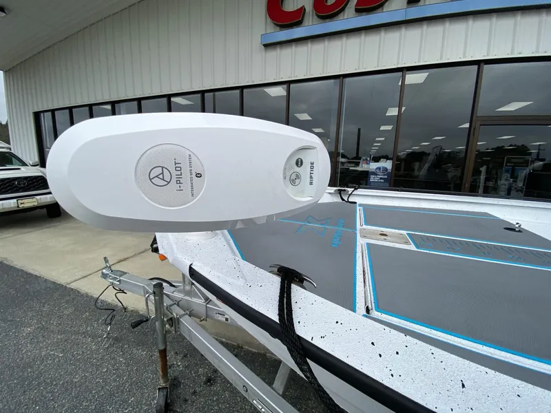 Slide: The Image of 2021 Xpress H190B boat with i-Pilot trolling motor in dealership lot. - 2