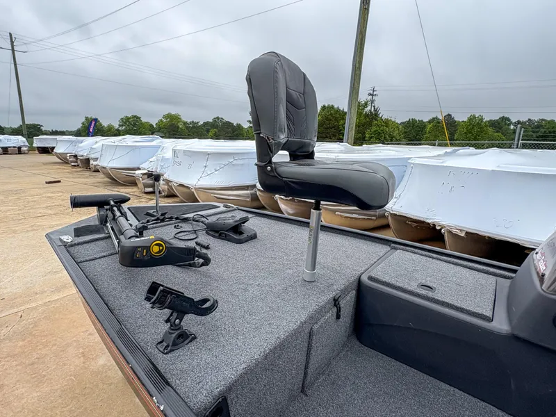 Slide: The Image of 2021 Tracker Bass Tracker Classic XL boat deck with seat and fishing equipment. - 3