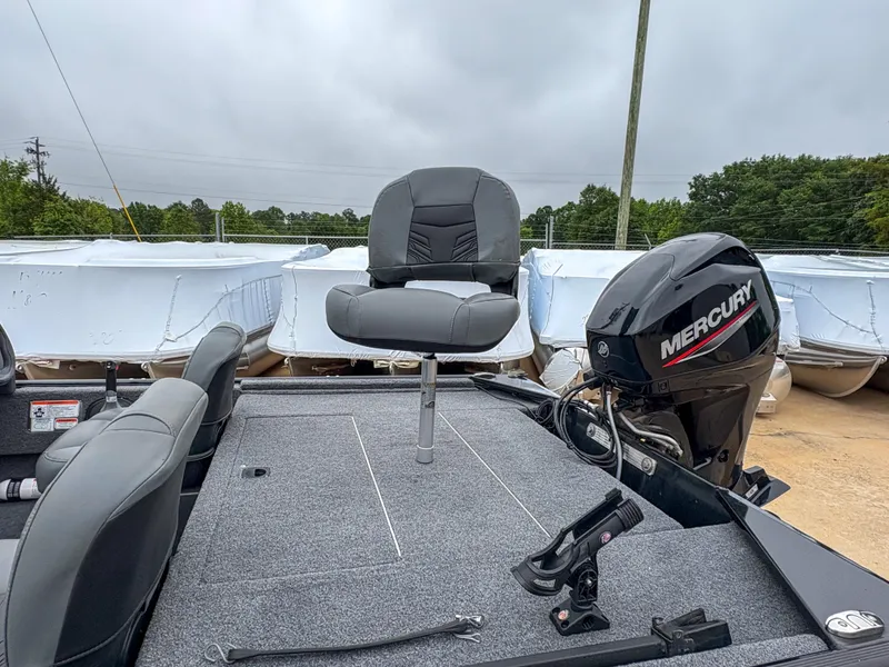 Slide: The Image of 2021 Tracker Bass Tracker Classic XL boat with Mercury engine, featuring a comfortable swivel seat. - 7