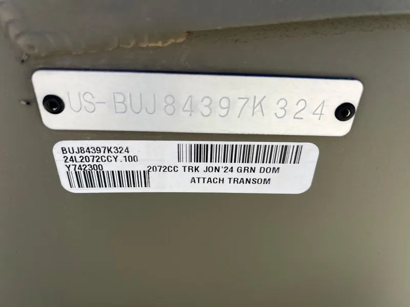 Slide: The Image of 2024 Tracker Grizzly 2072 CC boat identification plate with serial numbers and barcodes. - 10