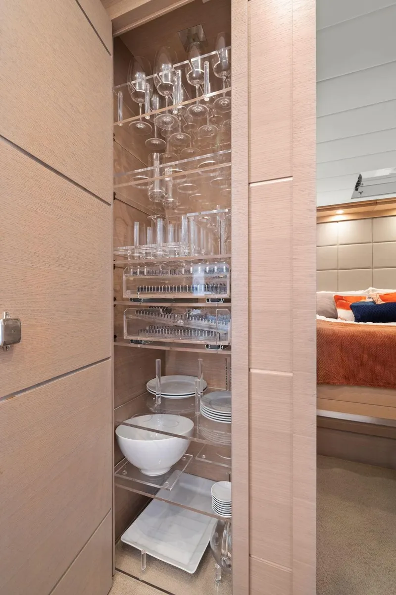 Slide: The Image of Luxurious cabin interior of 2010 Mangusta 72 Express yacht with bunk beds and modern decor. - 44