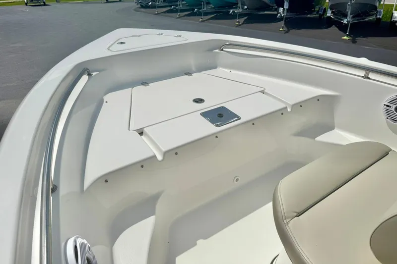 Slide: The Image of 2023 Key West 189 FS boat interior with seating and storage compartments. - 12