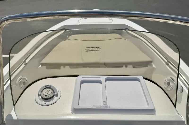 Slide: The Image of 2023 Key West 189 FS boat interior with console and seating area. - 23
