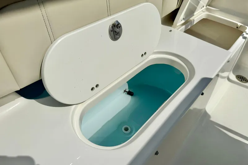 Slide: The Image of 2023 Key West 189 FS boat livewell with open lid, showcasing interior. - 32