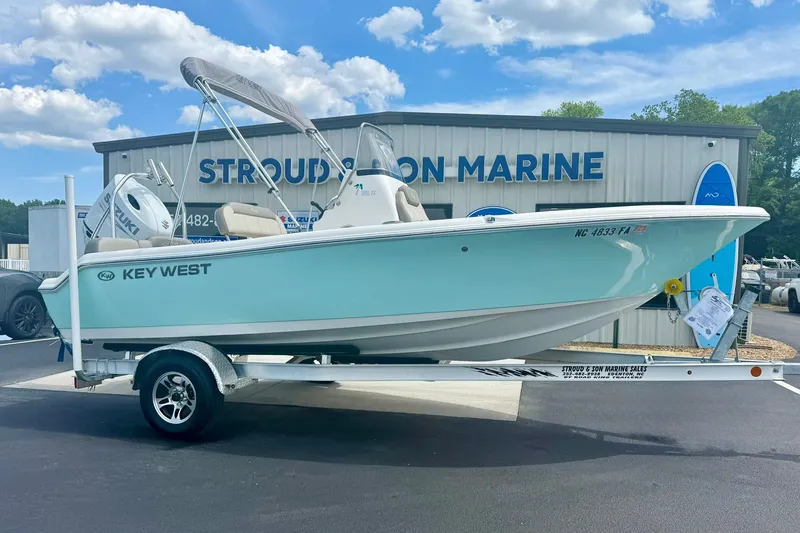 Slide: The Image of 2023 Key West 189 FS boat on trailer at Stroud & Son Marine dealership. - 5